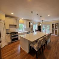 Kitchen with wood floors and large island