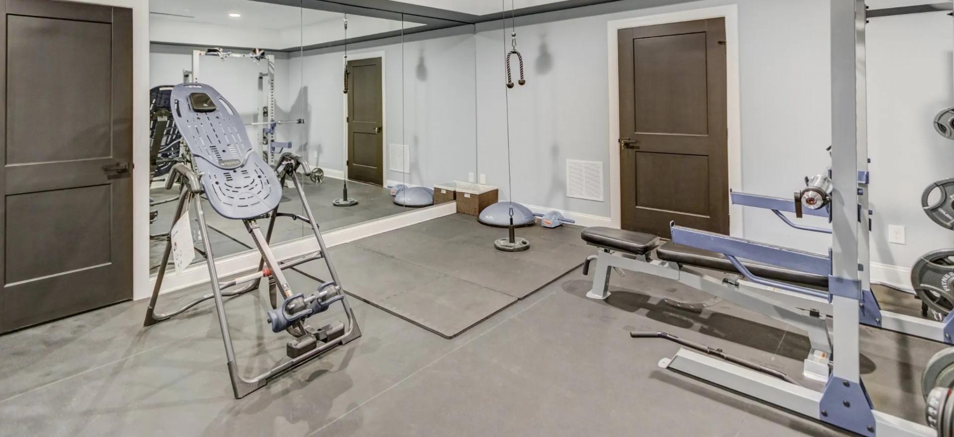 basement converted into a home gym 